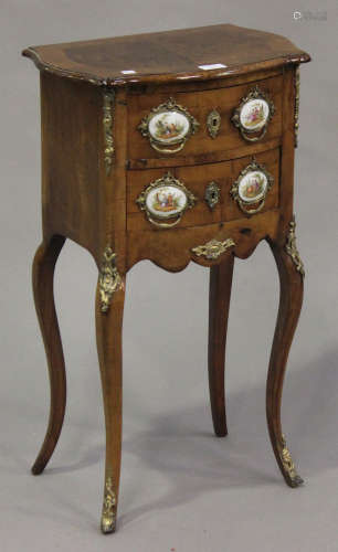 A late 19th century French walnut and porcelain mounted chest of two drawers with applied gilt metal