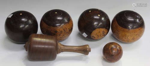 A group of four 19th century hardwood bowling bowls, a fruitwood jack and a 20th century