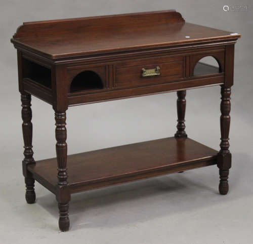 A late Victorian Aesthetic period walnut side table, fitted with a drawer, raised on turned and