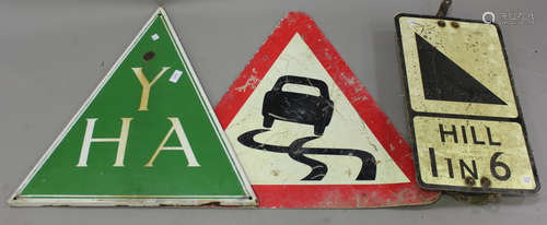 A 'YHA' green enamelled triangular sign, height 60cm, together with two road signs.Buyer’s Premium