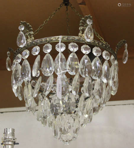 A set of three mid-20th century gilt metal and cut glass ceiling lights, the circlets with anthemion