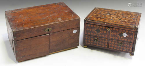 A Victorian mahogany games compendium box, the hinged lid and front revealing a partially fitted