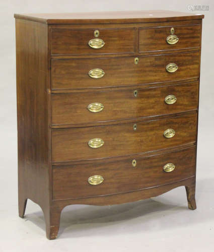 An early Victorian mahogany bowfront chest of two short and four long drawers, on outswept bracket