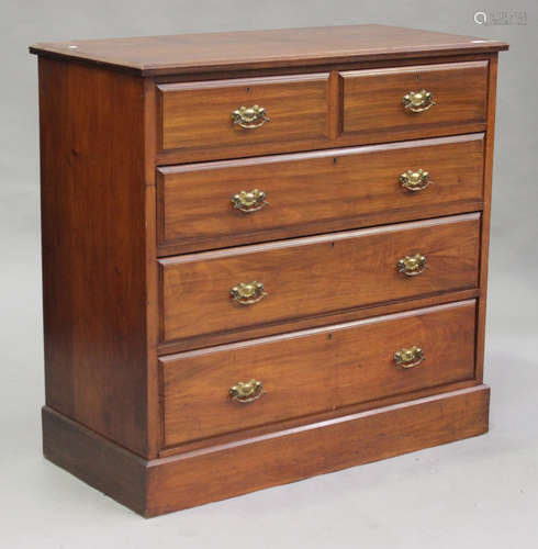 An Edwardian walnut chest of two short and three long drawers, on a plinth base, height 111cm, width