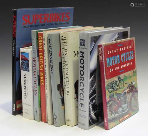 A group of books relating to motorcycles, including 'The Encyclopedia of the Motorcycle' by Peter