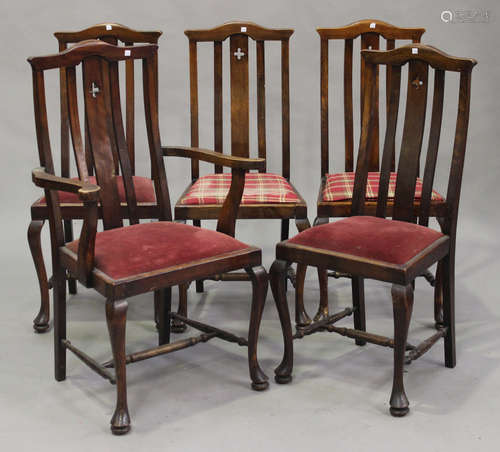 A set of five Edwardian stained beech dining chairs, comprising one carver and four standards,