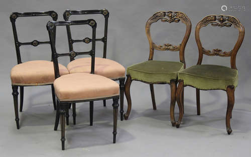 A set of three late Victorian Aesthetic period ebonized dining chairs, together with a pair of