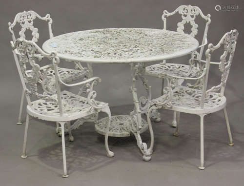 A 20th century white painted cast aluminium circular garden table, diameter 110cm, together with a