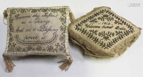 Two early 19th century ivory silk and silver beaded layette pin cushions, one inscribed '1815