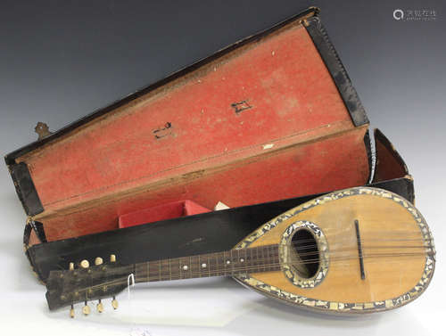 An early 20th century Neapolitan mandolin, the interior bearing label inscribed 'Heralda', length