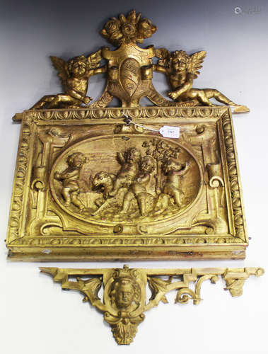 A 19th century giltwood and gesso rectangular door panel, carved in relief with a scene of four