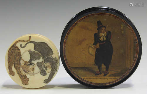 A 19th century papier-mâché circular snuff box, the lid printed with an amusing depiction of an