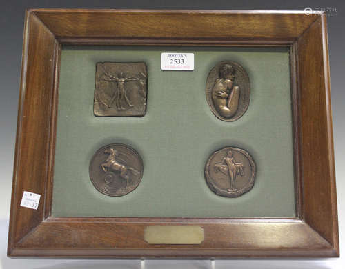 Enzo Plazzotta - four late 20th century brown patinated cast bronze medallions, comprising 'Leonardo