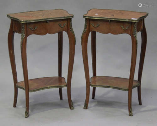 A pair of 20th century kingwood and foliate inlaid bedside tables with gilt metal mounts, the shaped