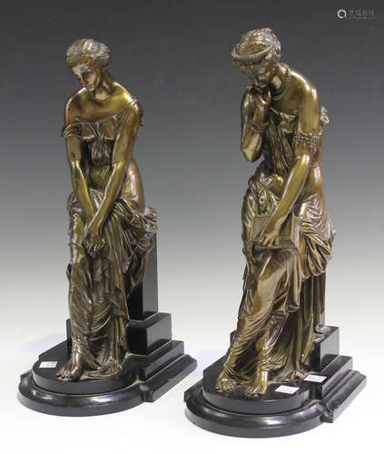 A pair of late 19th century French brown patinated cast bronze figures of classical maidens, each