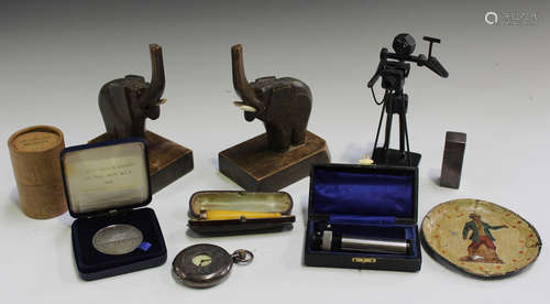 A small group of collectors' items, including a silver half hunter pocket watch, an amber cheroot