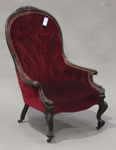 A Victorian mahogany showframe lady's salon chair with carved scroll and foliate decoration,
