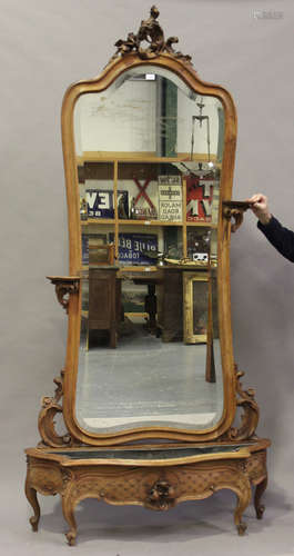 A late 19th century French walnut jardinière hall mirror, the large bevelled glass panel with an