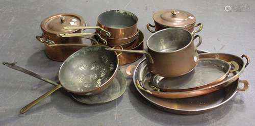 A group of 19th century and later copper cooking pans and other kitchenalia, including saucepans,