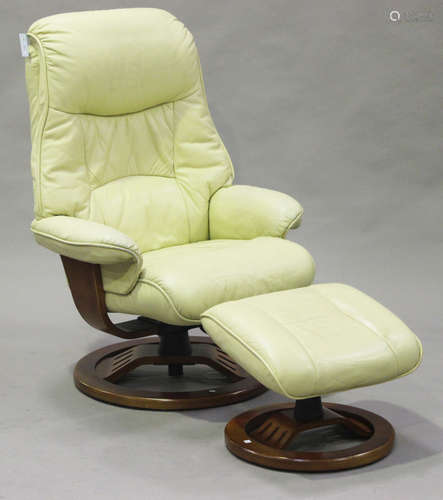 A modern cream leather 'Stressless' reclining armchair and stool, height 107cm.Buyer’s Premium 29.4%