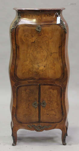 A late 19th/early 20th century French Louis XV style walnut and floral inlaid secrétaire à