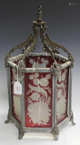 A late 19th century zinc framed hexagonal hanging hall lantern, each side inset with red flashed and