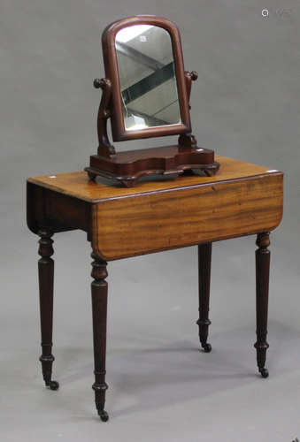 A Victorian mahogany Pembroke table, fitted with a drawer, raised on turned legs and castors, height