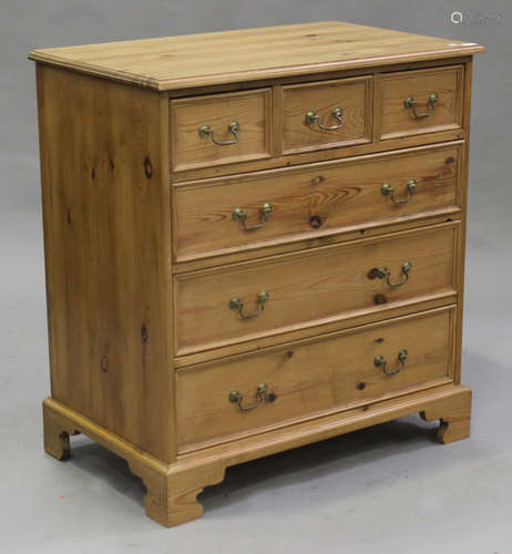 A modern pine chest of three short and three long drawers, on bracket feet, height 99cm, width 92cm,