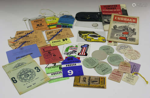 A collection of motor racing ephemera, including two 1950s race programmes, a group of 1960s '24