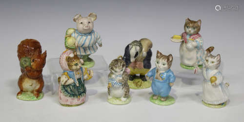 A collection of eight Beswick Beatrix Potter figures, comprising 'Little Pig Robinson' and '
