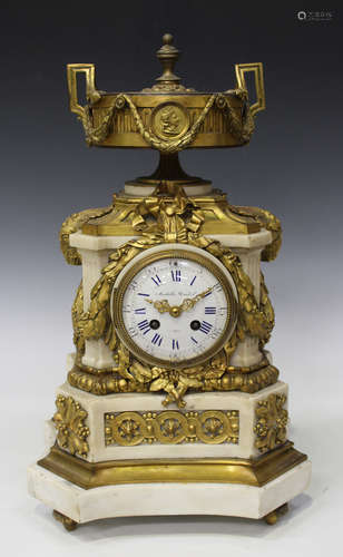 A late 19th century French ormolu mounted white marble mantel clock with eight day movement striking