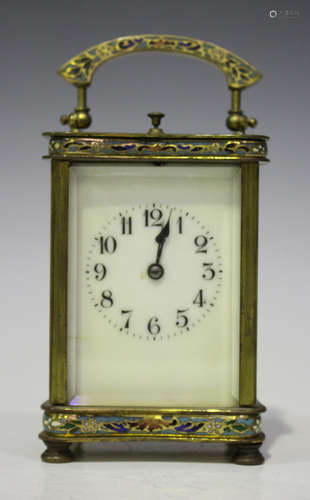 A late 19th/early 20th century French lacquered brass and champlevé enamel carriage clock with eight