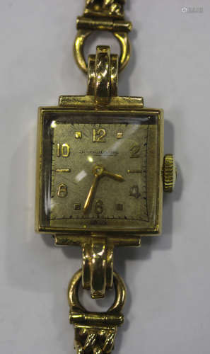A Jaeger-LeCoultre 9ct gold square cased lady's bracelet wristwatch with a signed jewelled movement,