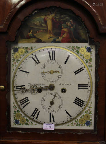 An early 19th century mahogany longcase clock with eight day movement striking on a bell, the