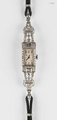 A platinum and diamond set lady's cocktail wristwatch, the movement detailed 'Movado Facto', the