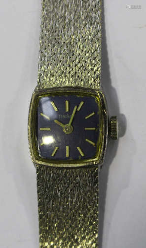 A Tissot 9ct white gold lady's bracelet wristwatch, the curved square blue dial with baton hour