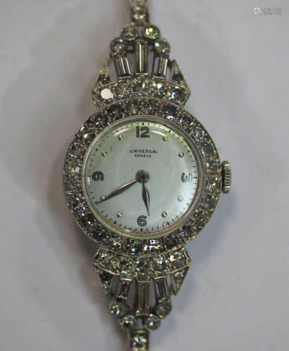 A Universal Genève steel circular cased lady's wristwatch, the signed jewelled movement numbered '
