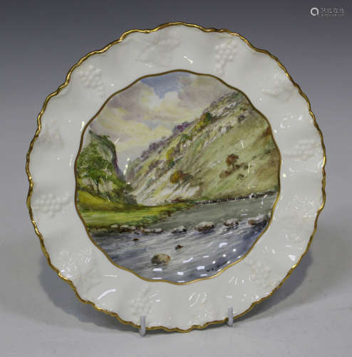 A Royal Crown Derby porcelain cabinet plate, painted by W.E.J. Dean, signed with a titled view of '
