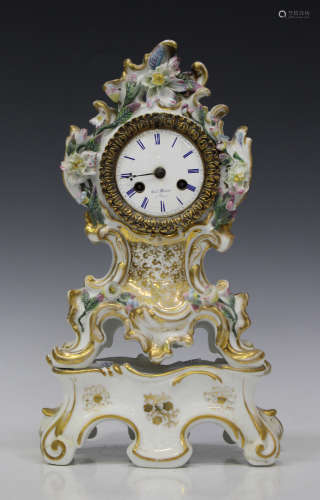 A French Paris porcelain mantel clock and stand, mid-19th century, with eight day movement