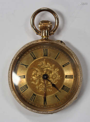 A 14ct gold cased keyless wind open-faced lady's fob watch with a gilt cylinder movement, gilt metal