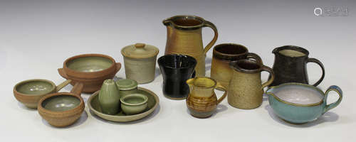 Two Michael Leach Yelland stoneware pottery jugs, the first with grey splashed brown glaze, the