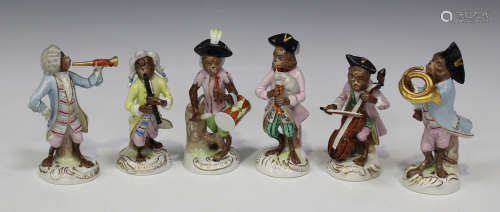 A set of six Continental porcelain Meissen style Monkey Band figures, 20th century, including a