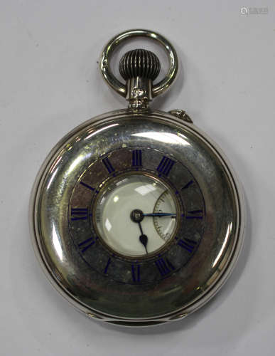 A silver keyless wind half-hunting cased gentleman's pocket watch, the gilt movement detailed to the