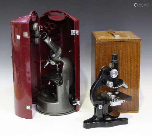 A 20th century black enamelled monocular microscope, signed 'Ernst Wetzlar No 324375', with carrying