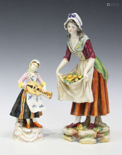 A Continental porcelain figure of a fruit seller, circa 1900, modelled standing on a rocky base,