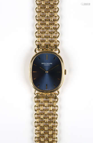 A Patek Philippe Ellipse 18ct gold oval cased gentleman's bracelet wristwatch, the signed blue