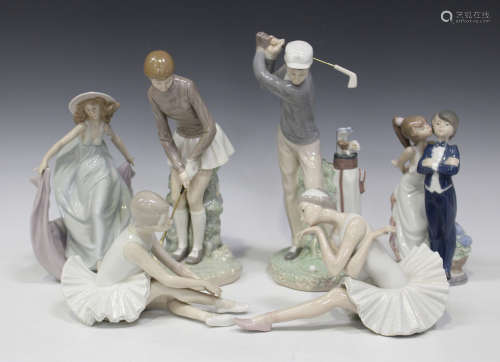 A collection of thirteen Lladro porcelain figures, including May Dance, No. 5662, Golfer, No.