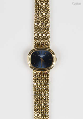 A Patek Philippe Ellipse 18ct gold oval cased lady's bracelet wristwatch, the signed blue metallic