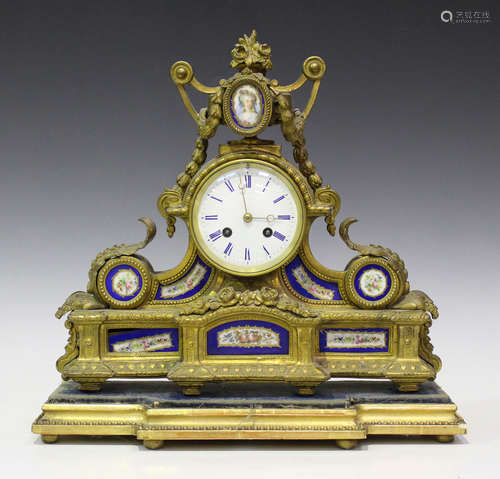 A late 19th century French gilt spelter and porcelain mantel clock with eight day movement