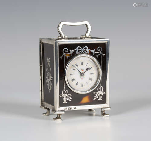 A George V silver mounted tortoiseshell carriage timepiece, the French movement with platform